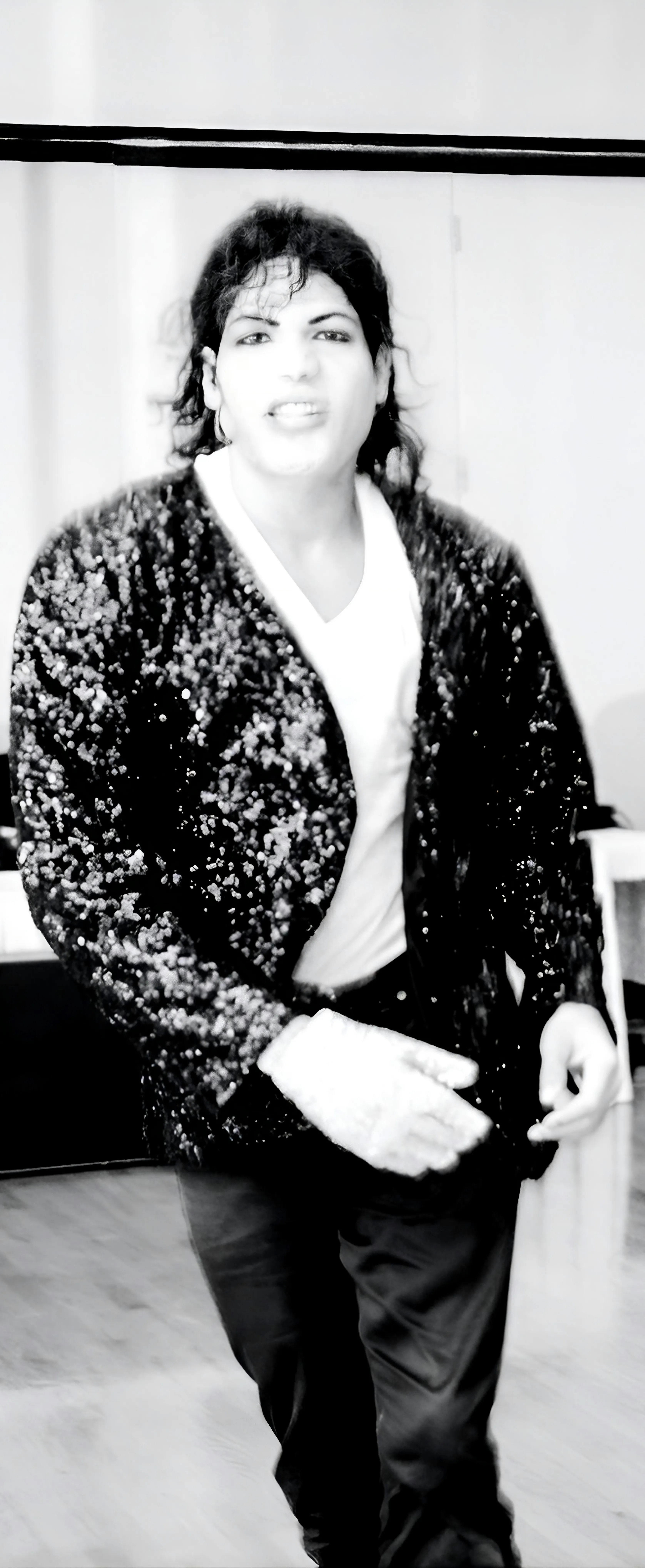 MJ3 gazes directly in camera view while performing in sequin jacket to Billie Jean for a New York corporate event